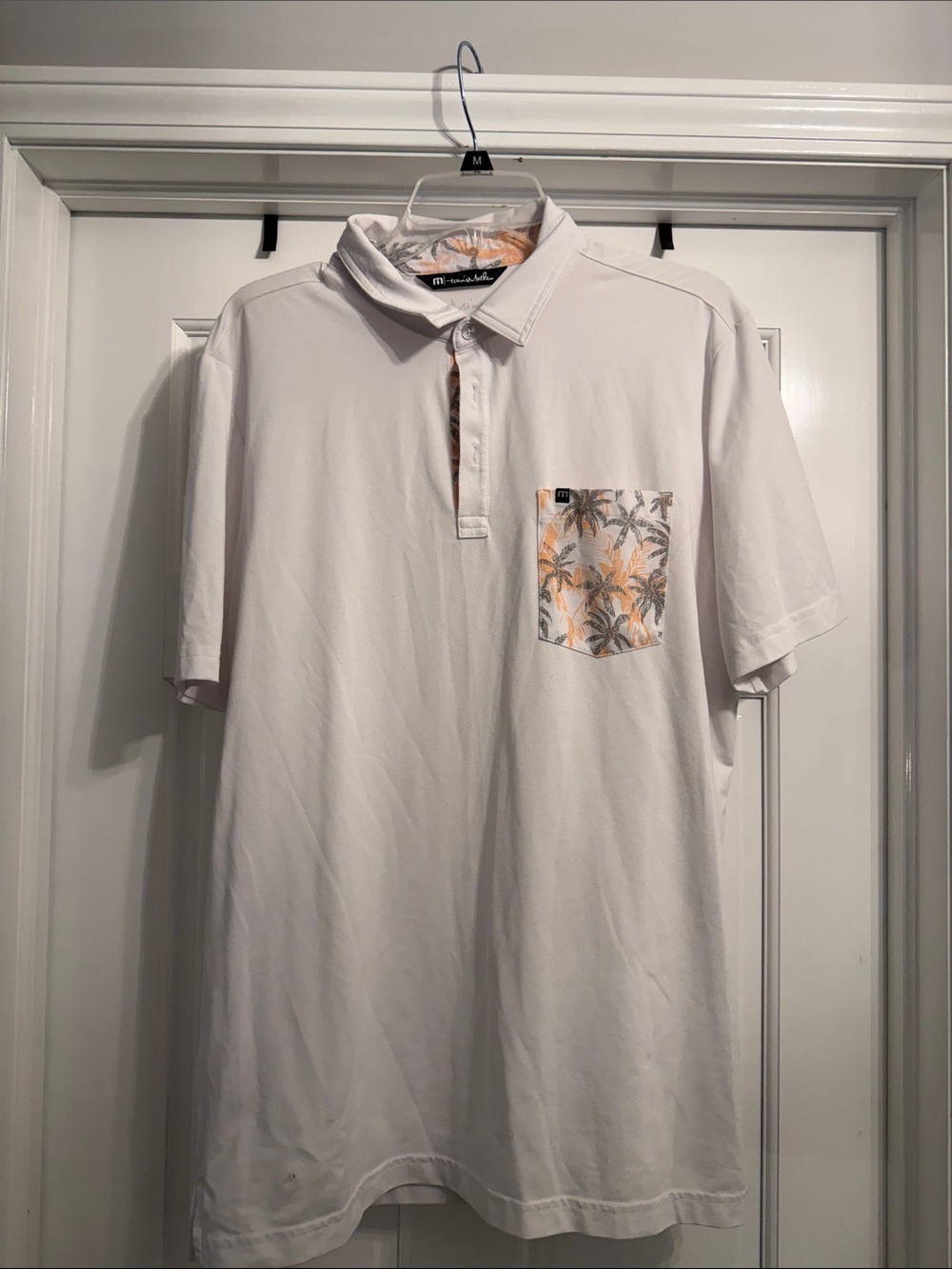 TravisMathew White Polo with Palm-Print Pocket size large